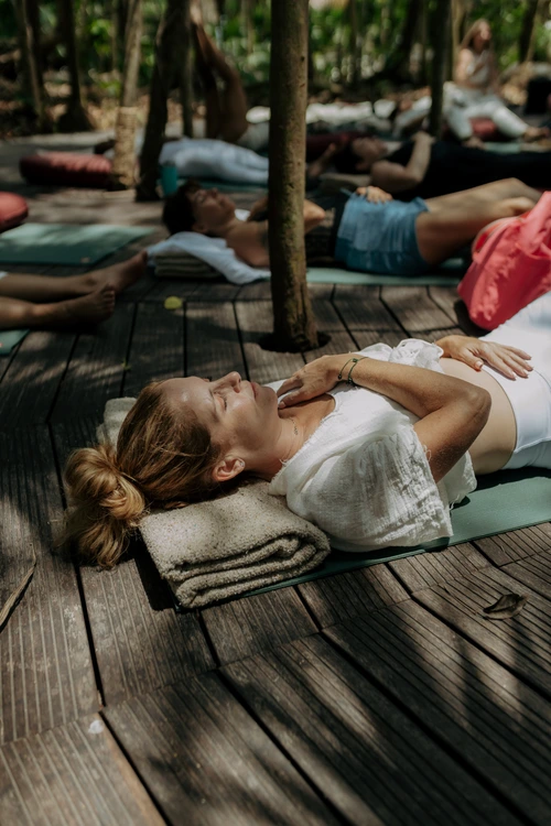 Women in savasana during retreat