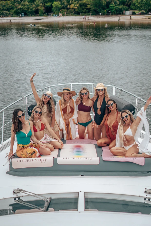 Starseed Summit guests together on the bow of the yacht during the 2026 Summit