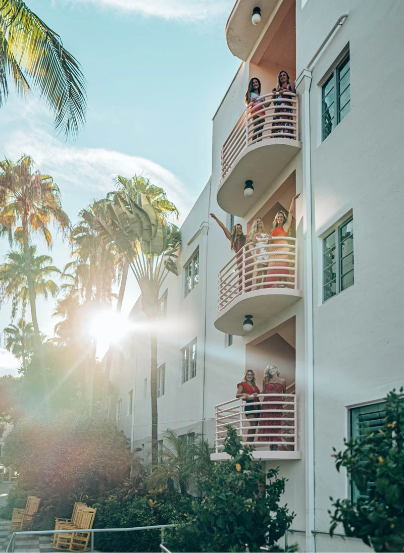 Women on balconies at Miami venue