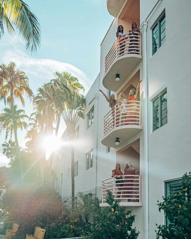 Women on balconies at Miami venue