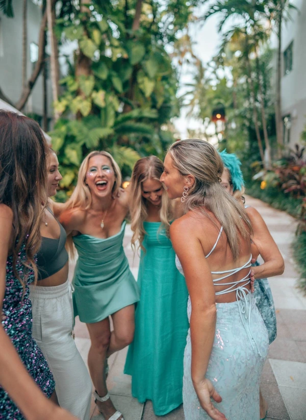Women laughing together in sisterhood
