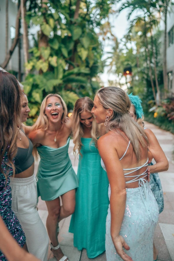 Women laughing together in sisterhood
